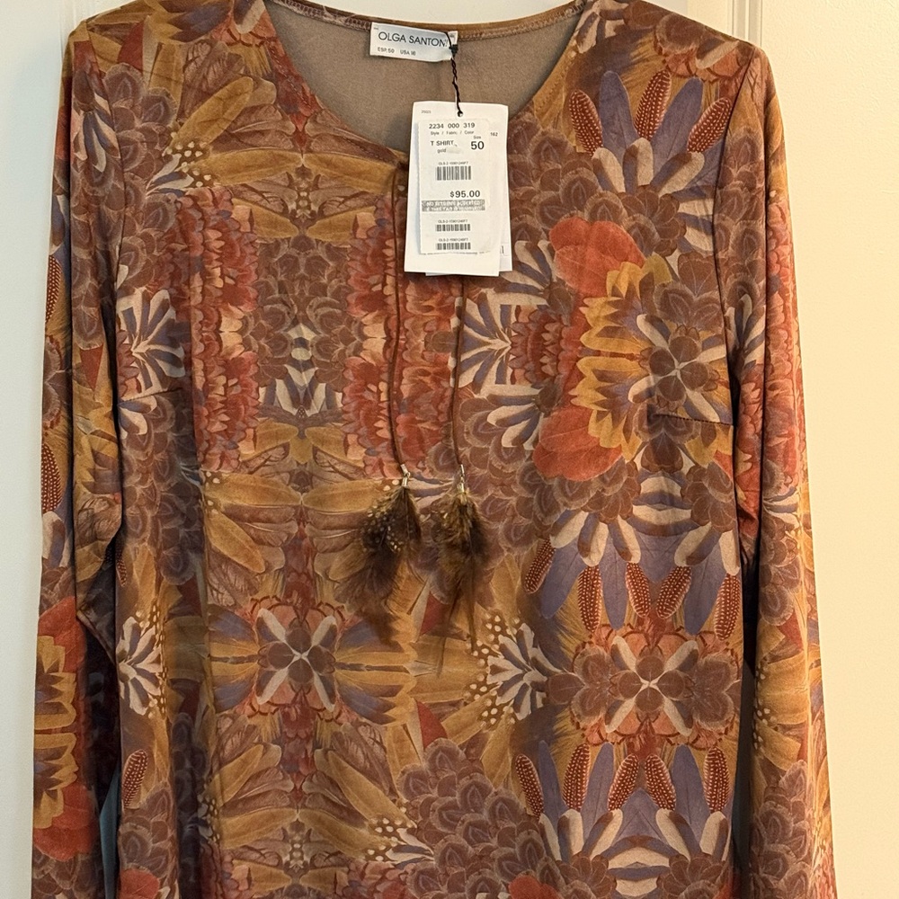 Elegant/Feather accessorized blouse fits like xl